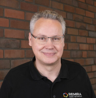 Smiling man with short gray hair and glasses - Marek Matuszewski; Copyright: REMIRA