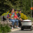 The delivery robot arrives at the students; Copyright: Starship