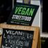Street sign from a vegan restaurant; Copyright: FitNish Media/Unsplash