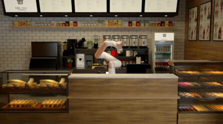 A robot working at the counter in a bakery