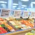 digital price tags hang side by side over a fruit and vegetable stand