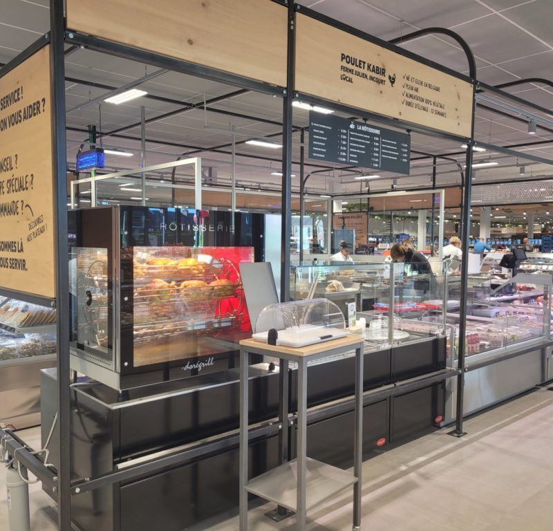 A meat counter in louis delhaize OPEN MARKET