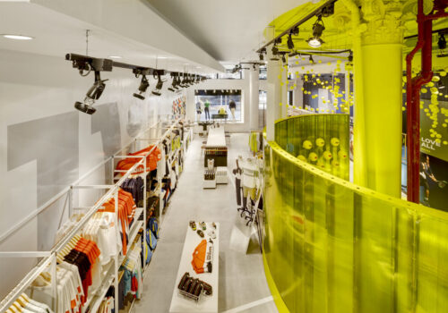 Wilson pop-up store with a yellow store design with tennis balls in in New York City