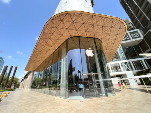 A modern building with Apple logo from the outside