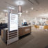 Furniture showroom with digital signage, desks and consultation spaces