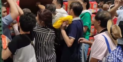 Chinese customers crowding together in a store