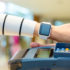 Person holding a smartwatch against a payment device; copyright: panthermedia.net/Leung Cho Pan