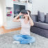 Woman in her home wearing virtual reality glasses; copyright: panthermedia.net/Mitar gavric