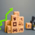 Forklift next to boxes and green up arrow