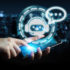 Hands holding smartphone with virtual chatbot icon; copyright: panthermedia.net/sdecoret