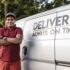 Man in front of a delivery truck; Copyright: Pexels / RODNAE Productions