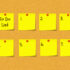 eight sticky notes on a cork pinboard