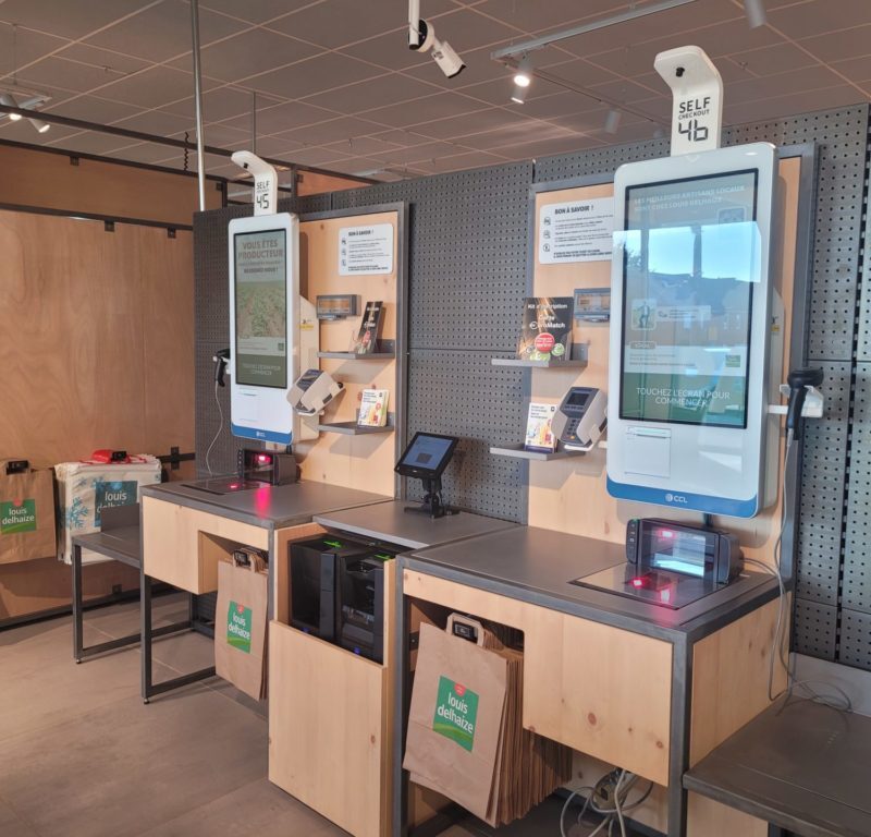 Two self-checkout counters in the louis delhaize OPEN MARKET